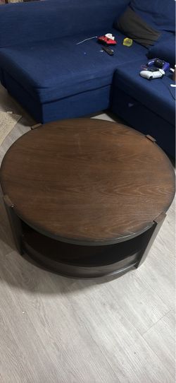Round Dark Wood Coffee Table with Shelf