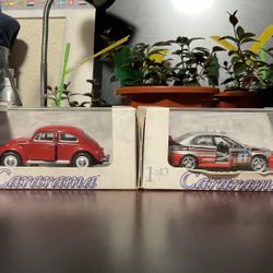 Collectible Cararama car models Volkswagen Beetle and Mitsubishi Lancer Evolution VI WRC