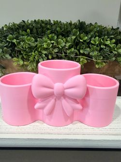 Bow makeup holder