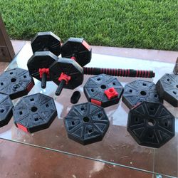 Dumbbells - 12 Plates And Two Bars