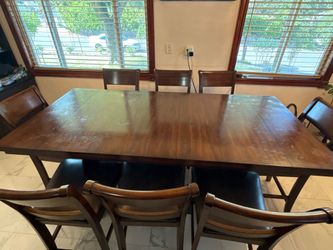 Table and 8 Chairs with 2 extensions