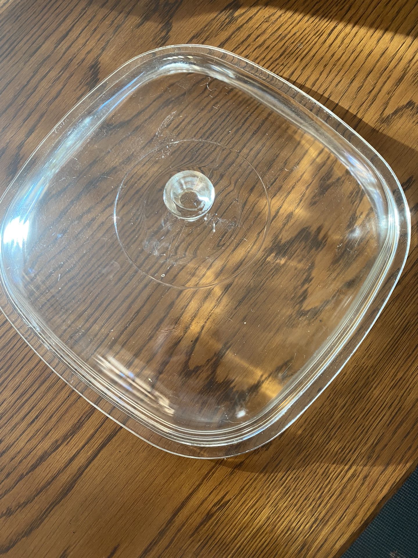 Corningware glass lid    Square.   Is 9 1/4 by 9 1/4” diagonal measure is 11 1/4”.   Used but in Perfect shape. (Broke my dish)