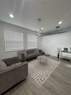 Gray Tufted Sofa + Oversized Chair