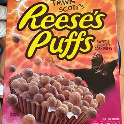 OFFICIAL TRAVIS SCOTT REESE’S PUFFS (SWEET & CRUNCHY CORN PUFFS, GENERAL MILLS FAMILY SIZE REESE’S PUFFS, NOT FIT FOR HUMAN CONSUMPTION)