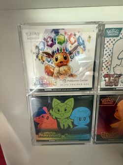 Pokemon center etb prismatic paldea evolved