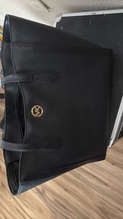 Michael Kora large purse used 2 times. $100