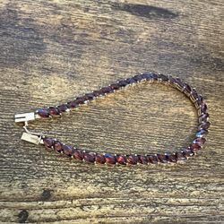 7 In. 14k Gold Garnet Tennis Bracelet