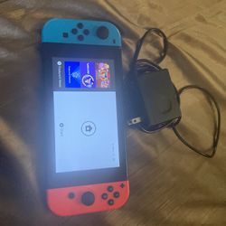 Nintendo Switch And Charger