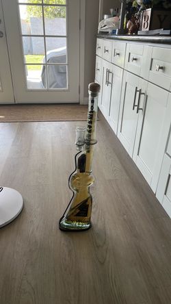 Old carbine tequila canister