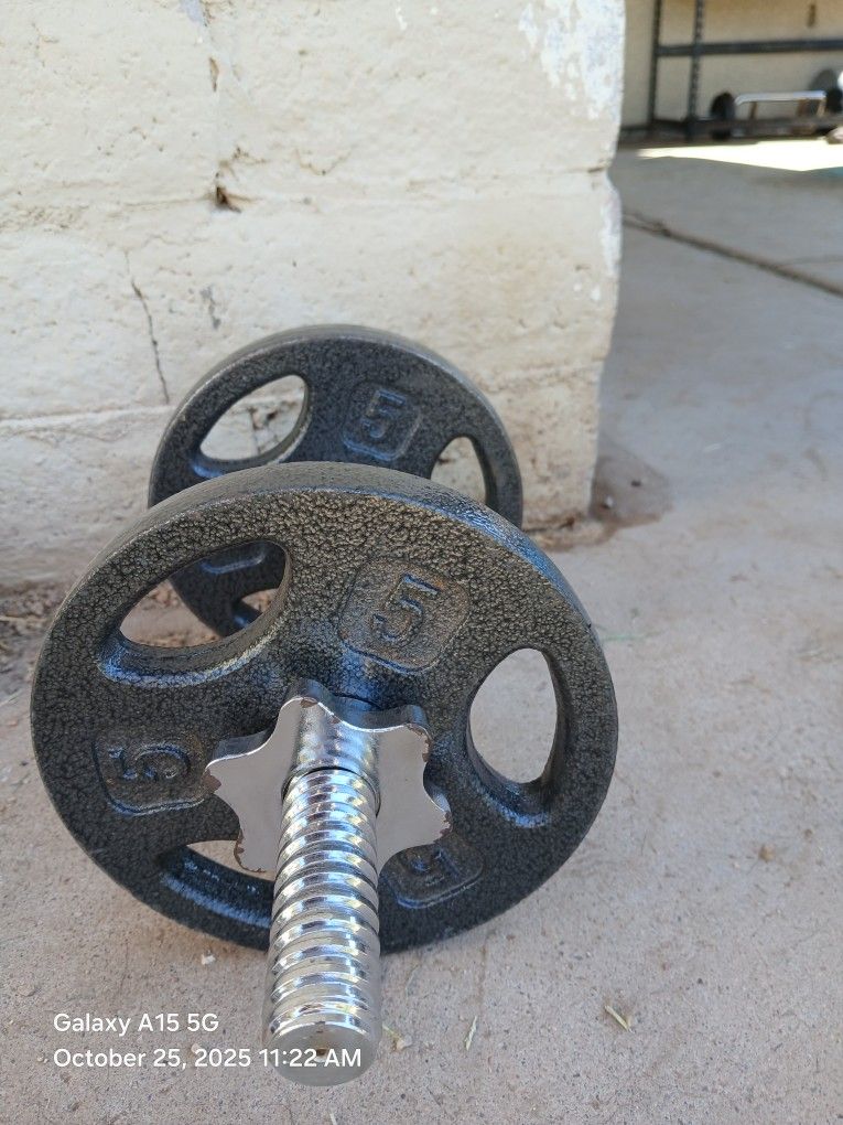 One 10 Lb. Adjustable Dumbbell With  (2) 5. Lb. Weight Plates On It, $15 Firm!