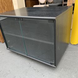 Rolling TV Stand with Glass Door Storage Good Condition 