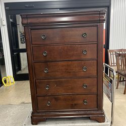 I sell cherry chest of drawers from the Elements Furniture Cameron collection, which features a traditional cherry finish and five spacious drawers