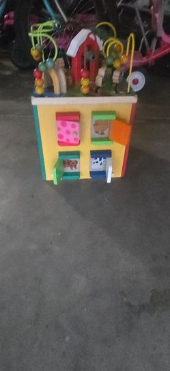 B. Toys Wooden Activity Zany Zoo Alpha Cube