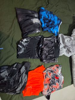 Nike and Under Armour  9 pairs of Mixed Lot of Athletic Shorts and Apparel