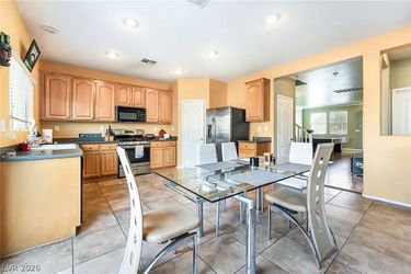 Glass Top Dining Table with 4 Chairs