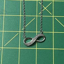 Genuine Diamonds And Sterling Silver Infinity Necklace 