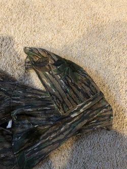 Adult XL netted jacket with hood and face shield.