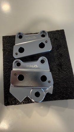 Forged racing peg mount