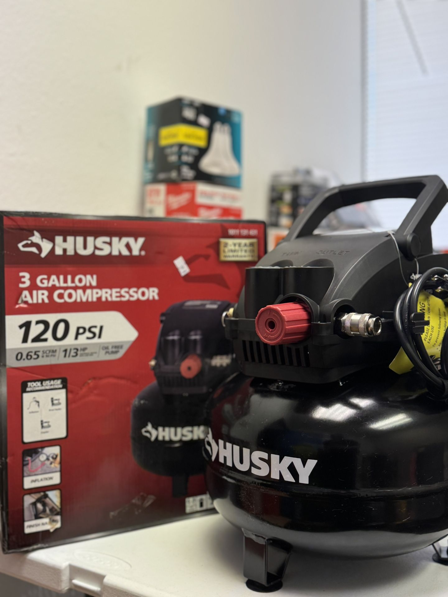 Husky 3 Gal. 120 PSI Portable Electric Oil-Free Light Duty Pancake Air Compressor with Fold Down Handle and 1-Quick Coupler