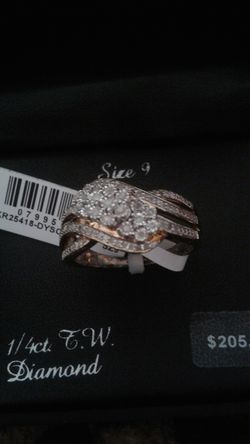 New 1/4kt. Diamond sterling size 9 ring still in the box