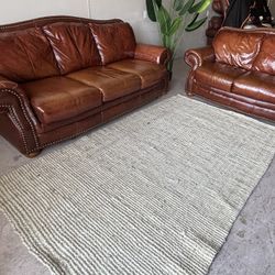 GENUINE LEATHER COUCH AND LOVE SEAT, DELIVERY INCLUDED  