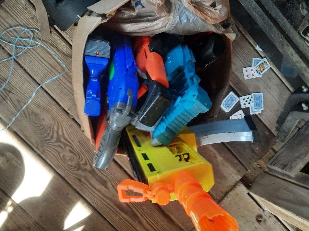 Box Of Nerf Guns With Darts And Balls