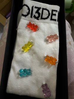 BNIB 13DE MARZO Gummy Bear Socks (Collector's Piece!) Description: For sale: A pair of brand new, in-box 13DE MARZO PARIS white socks featuring colorf