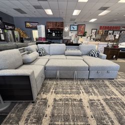 Sectional With Sleeper Sofa, 2 Fold-down Tables, Chaise Storage, Loveseat Storage, 2 Wireless Charging Ports, & Built In Shelf 