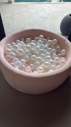 Baby girl pink ball pit