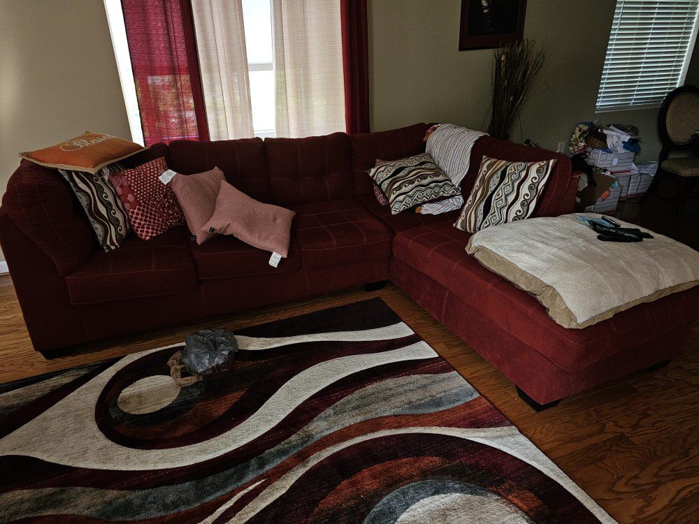 Red Sectional Couch for sell with 4 of the pillows