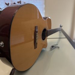 A Nice Acoustic Guitar With Case