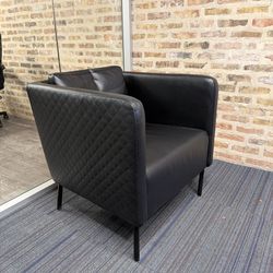 Black Upholstered Lounge Chair with Quilted Sides