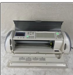 Cricut with cartridges.