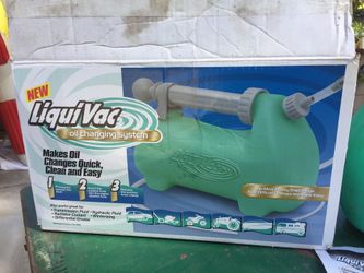 Liquid vac oil changing system
