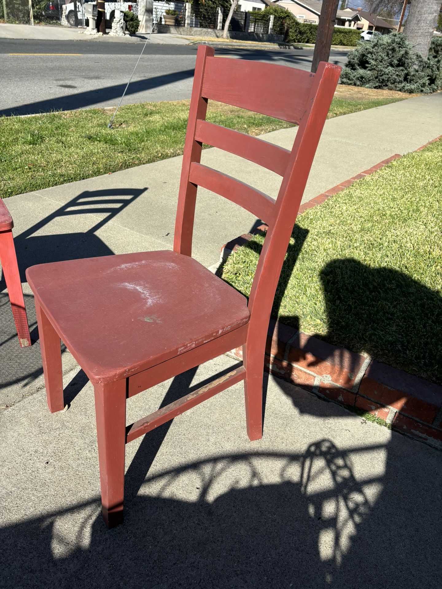 Two Red Wooden Chairs