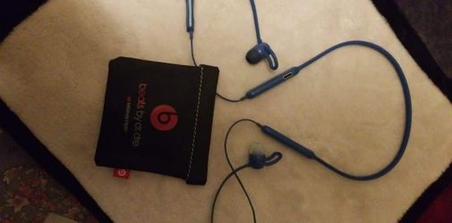 Beats by Dre wireless earbuds.