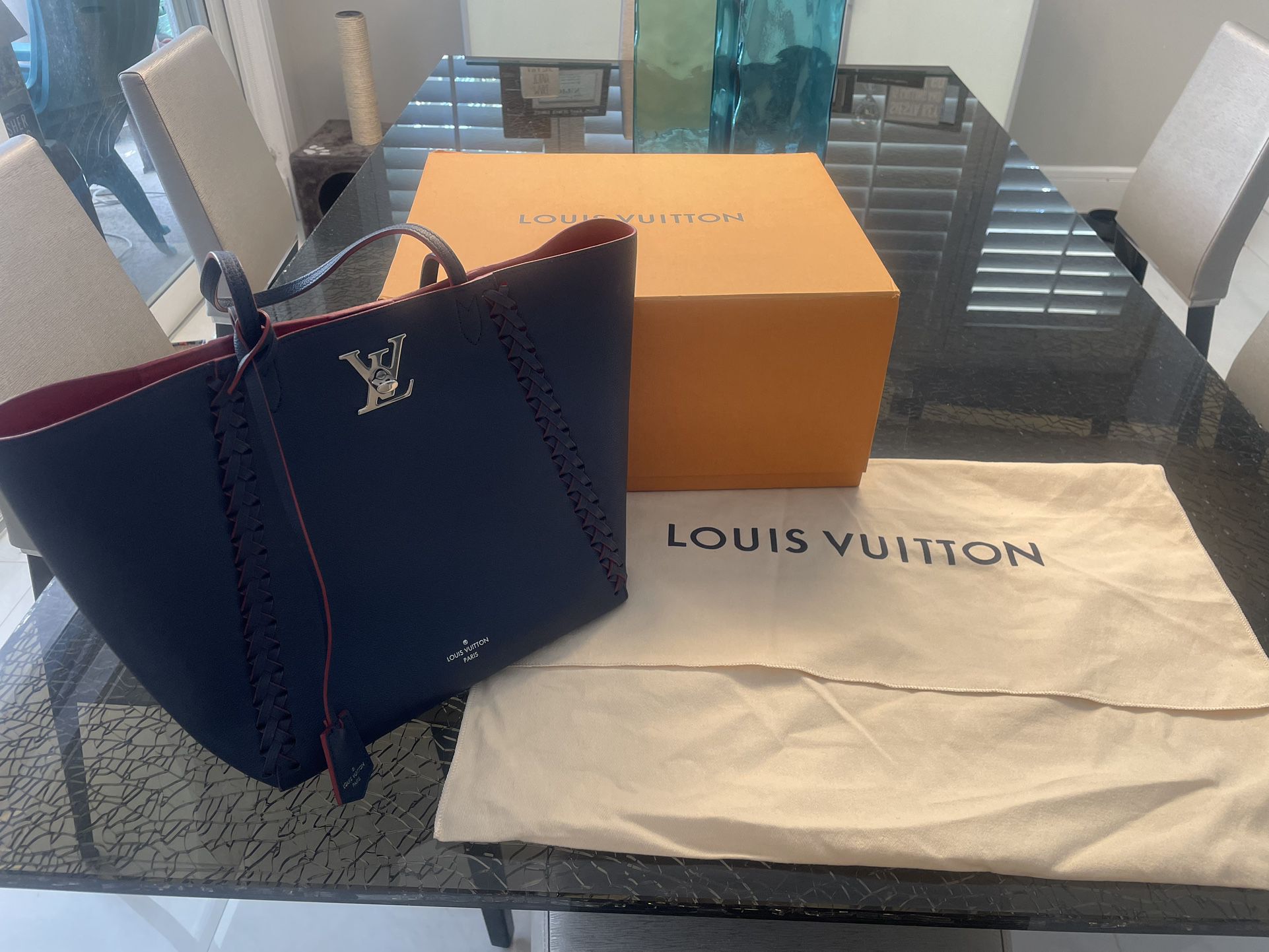 Authentic and Louis Vuitton Great Condition Blue, Lockme Purse for