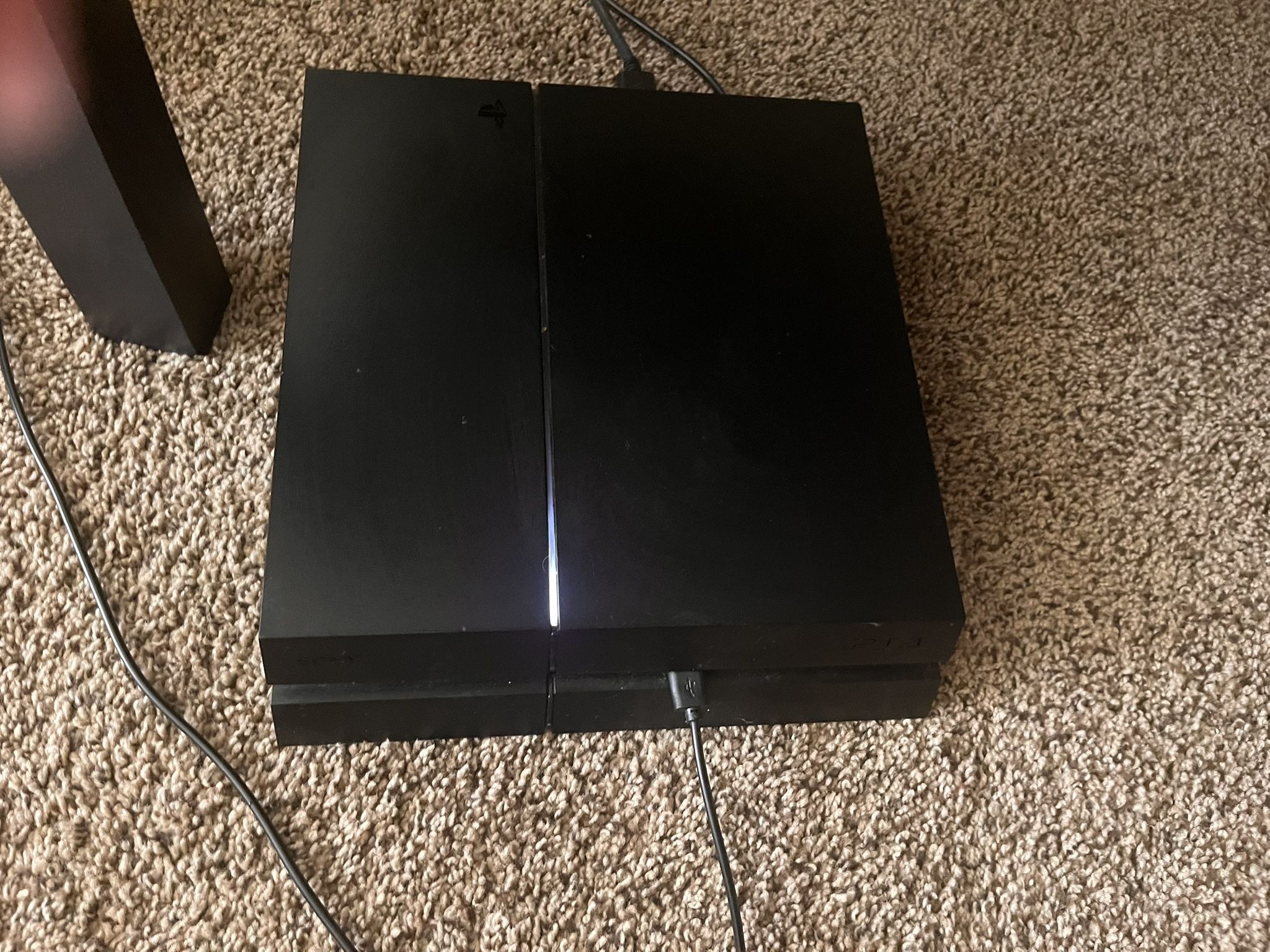 PlayStation 4 (Original) + Controller – $120