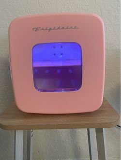 Pink mini fridge