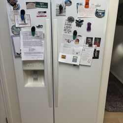 whirlpool  refrigerator approximately 10 years old in good working order including the icemaker