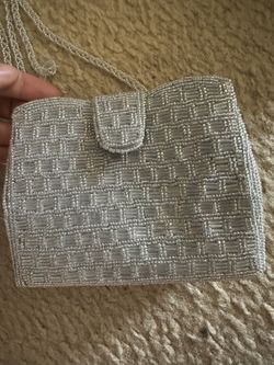 Silver sequined mini bag with long strap 