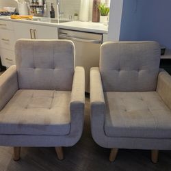 2 beige chairs