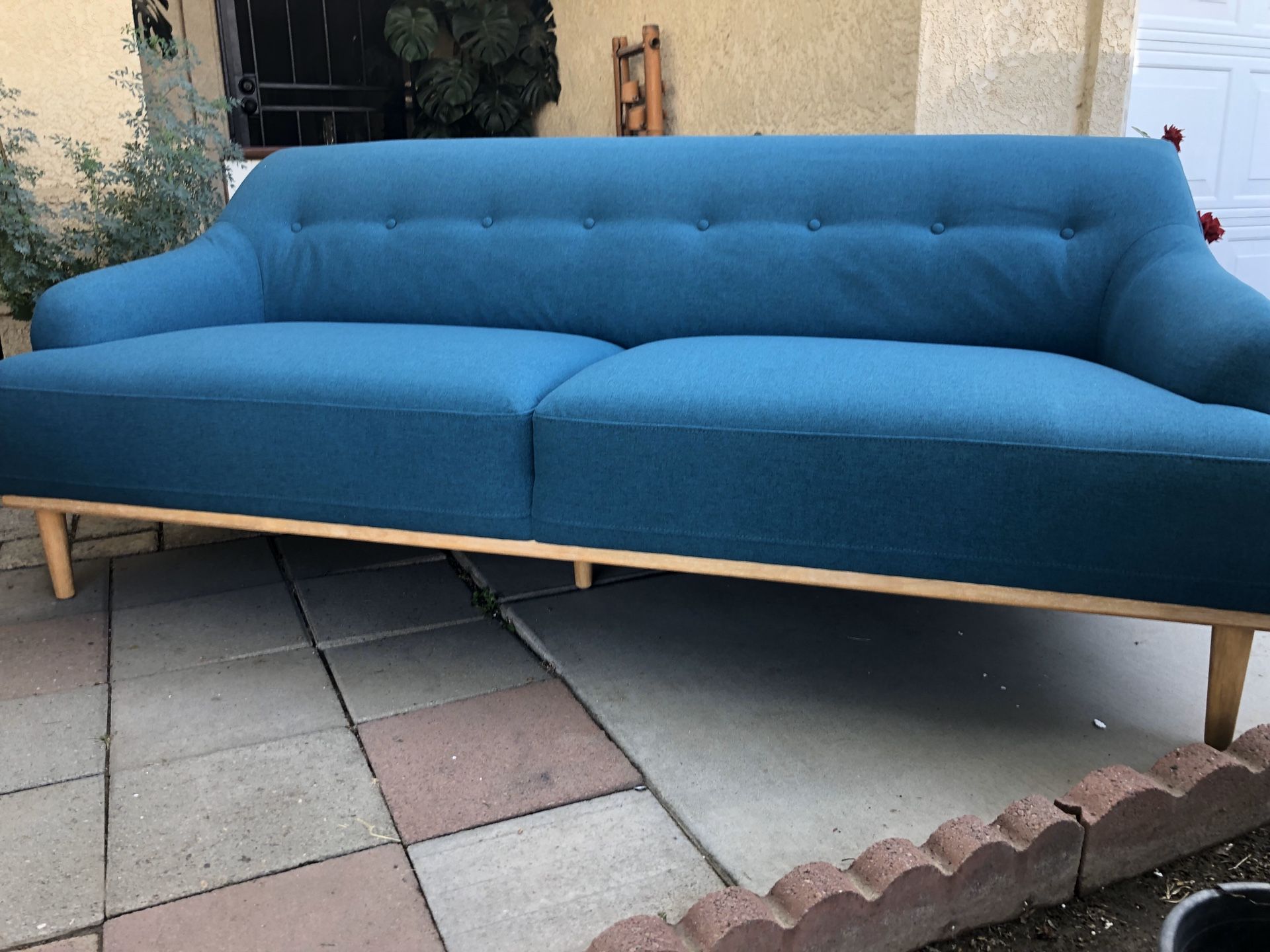 Brand new mid century style sofa. Retails for over $1300