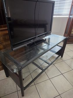 Dark Wood and Clear Glass Two-Tier TV Stand