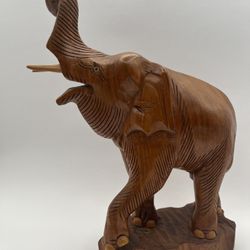 Vintage Wooden Carved Elephant Sculpture. Height: 13.25” Base : 7.25