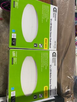 Two motion Sensor Lights ( New )