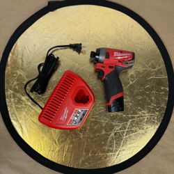 Used Milwaukee 2553-20 m12 1/4” hex impact driver with 2.0Ah battery and charger