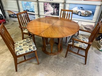 Vintage MCM dining table with 4 chairs.