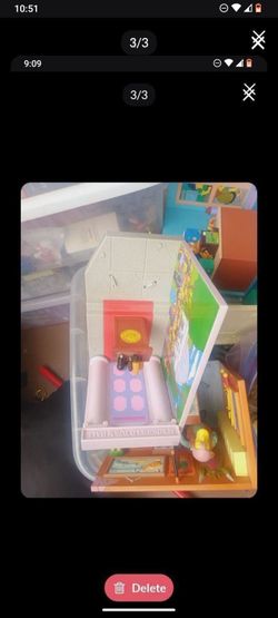 Toat full of loose Simpsons toys