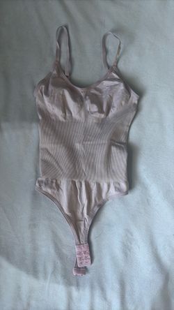 light pink bodysuit